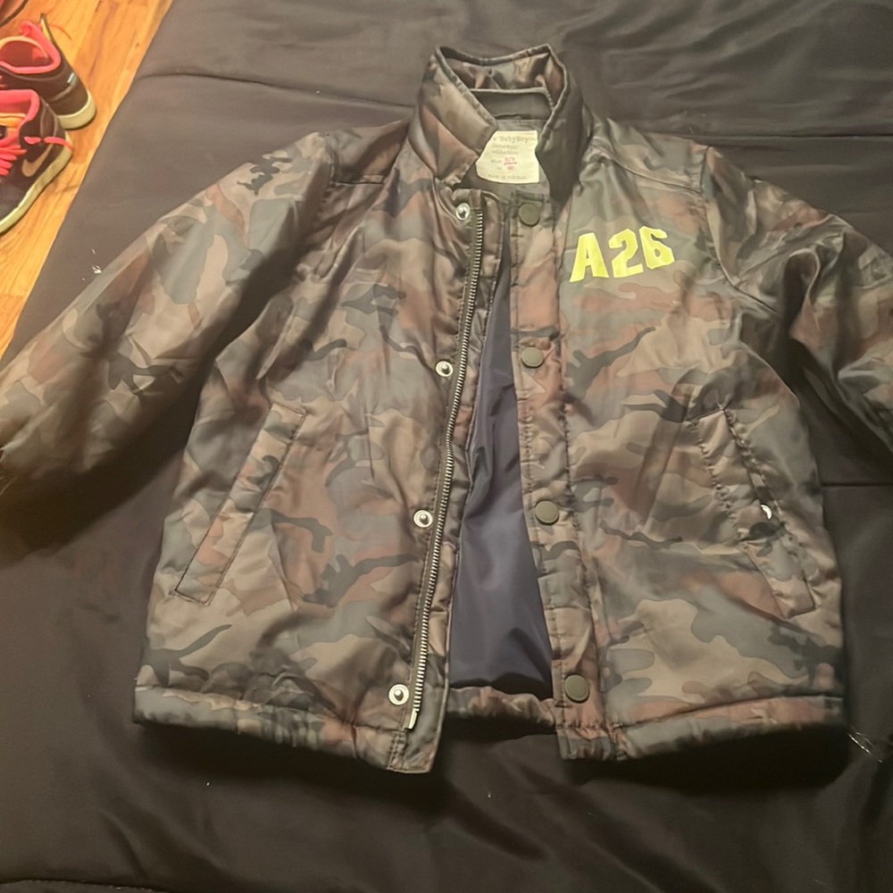 This is a light army fatigue jacket for little boys